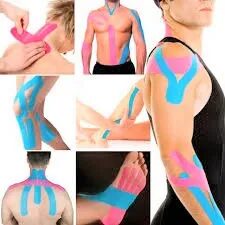A man with blue and pink kinesio tape on his arm.